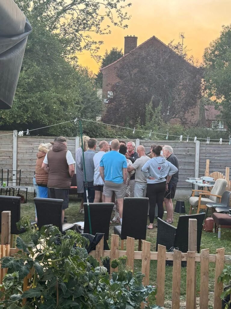 Praying together in the garden on a summer evening